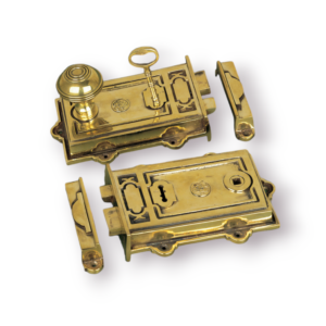 Davenport Brass Rim Lock in hand-aged unlacquered solid brass with matching keep and two brass keys.