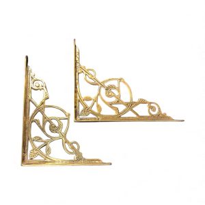 Small brass trellis shelf brackets with ornate vine and leaf design, 12.5 x 10 cm, unlacquered brass, sold as a pair.
