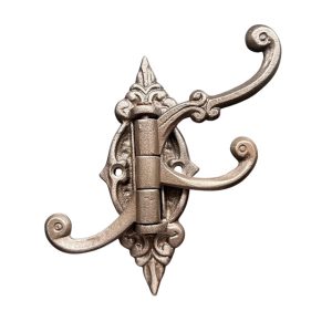 Ornate folding cast iron triple hook with antique iron finish, three folding arms, and decorative backplate for space-saving storage