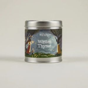 St. Eval Scented Christmas Tin Candle – Winter Thyme in a festive illustrated tin with 45-hour burn time and earthy herbal fragrance