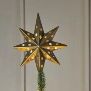 Gold distressed metal LED star by Lightstyle London illuminated with 10 warm white LEDs, featuring a pierced pattern for soft ambient light